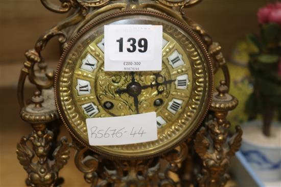 An ormolu mantel clock